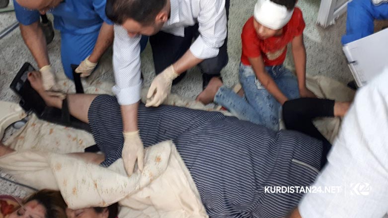 A mini bus carrying two Iraqi tourist families drove off a mountainous road in the Kurdistan Region, killing and injured tens of people  Aug. 30, 2019. (Photo: Kurdistan 24/Karwan Yara)